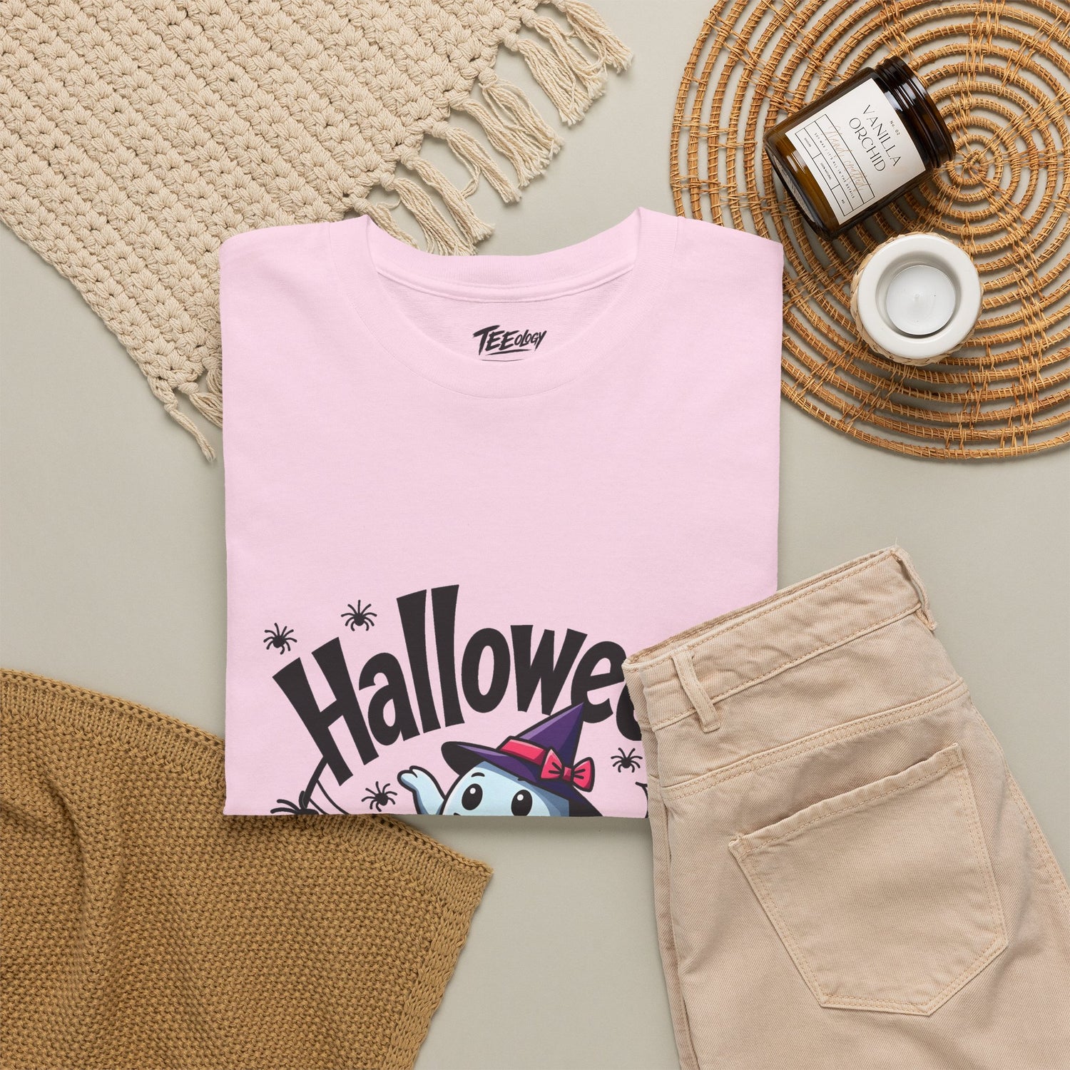 Ghost and jack-o’-lantern Halloween T-shirt by Teeology Clothing