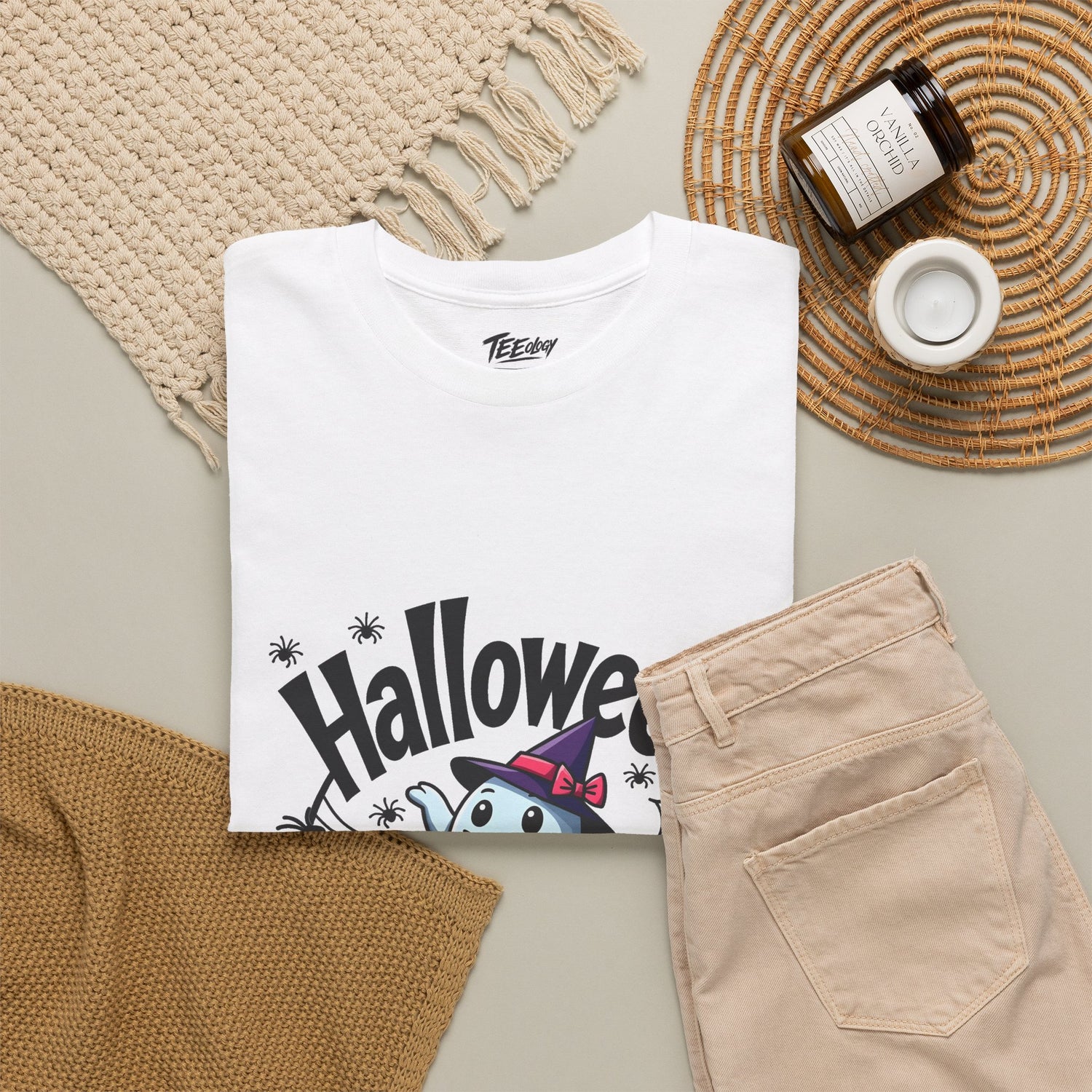 Ghost and jack-o’-lantern Halloween T-shirt by Teeology Clothing